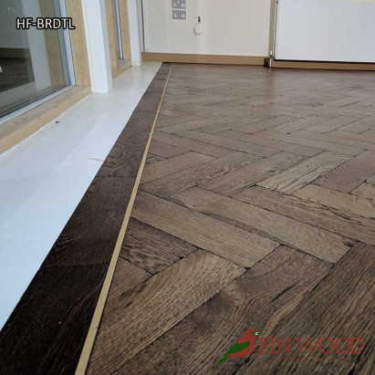 Herringbone flooring with border and tramline by Fin Wood Ltd London #CraftedForLife