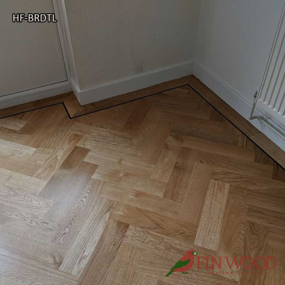 Herringbone flooring with border and tramline by Fin Wood Ltd London #CraftedForLife