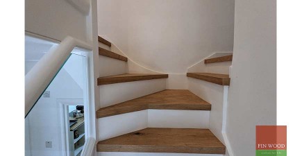 Engineered oak stair cladding with modern white painted risers uplifts a semi-detached family home, Epping Forest #CraftedForLife